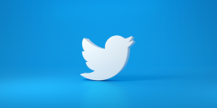 the twitter logo in a blue background with a light gradient 