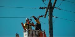 Workers working on power lines