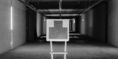 Grayscale Photo of Shooting Target Stand